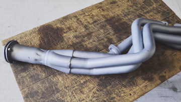 Racecraft flanged reducer cones showing adapter transition between exhaust pipe sizes