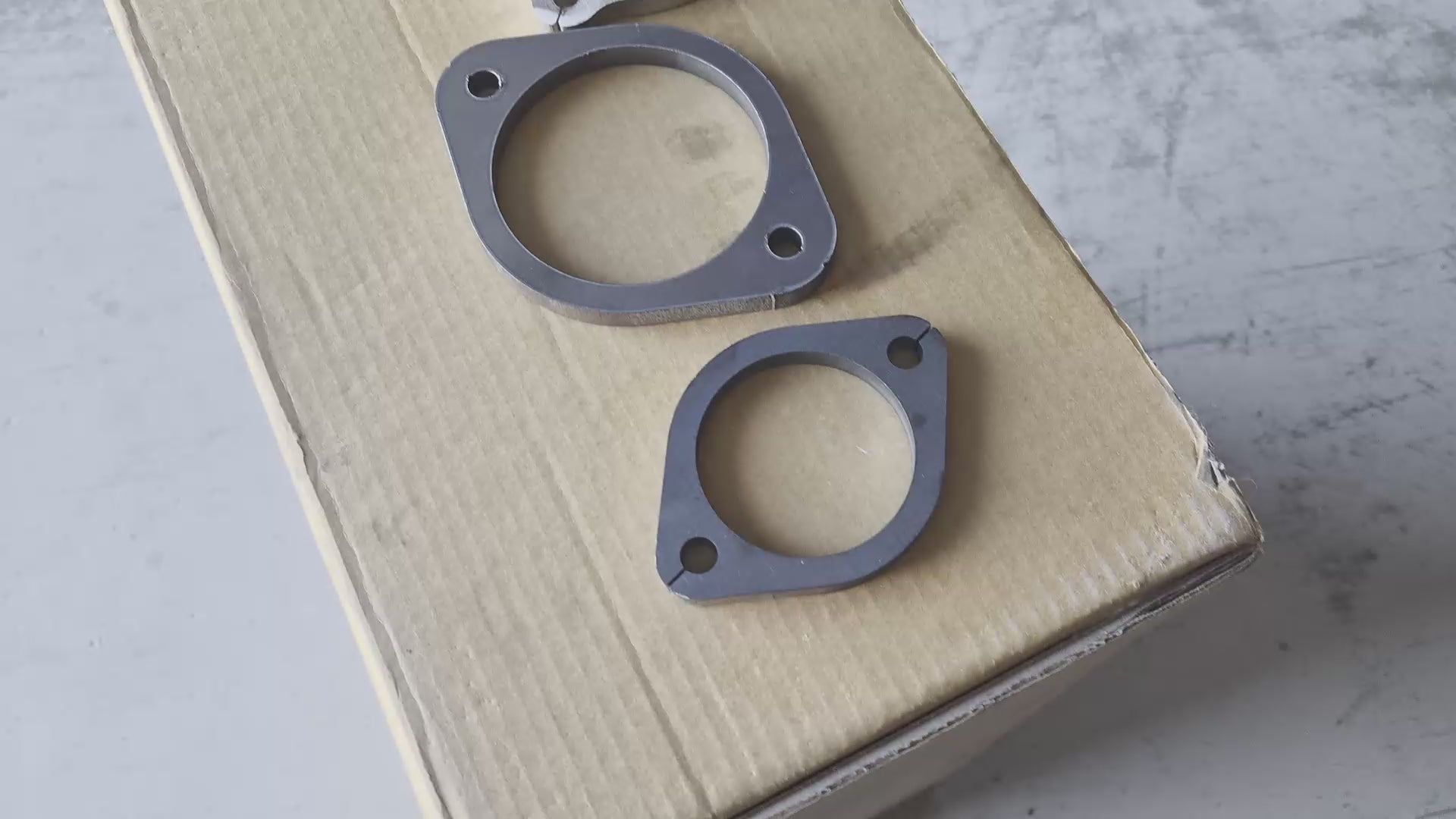 Video showing stainless steel exhaust flange sizes, surface finish, and complete kit versus flange-only options