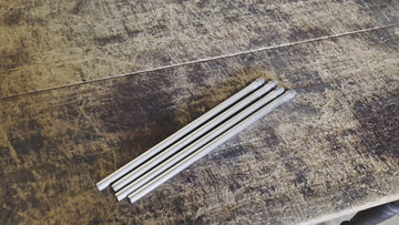 Round bar mushroom exhaust hanger rod welded to exhaust pipe for custom mounting