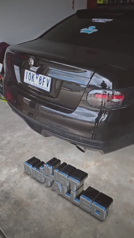 racecraft round stainless mufflers on holden ve v8 LS commodore with full exhaust