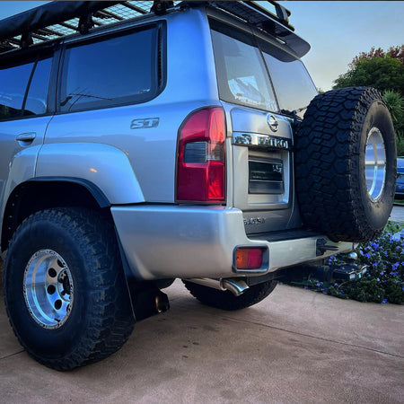 racecraft resonator on the rear of a nissan patrol