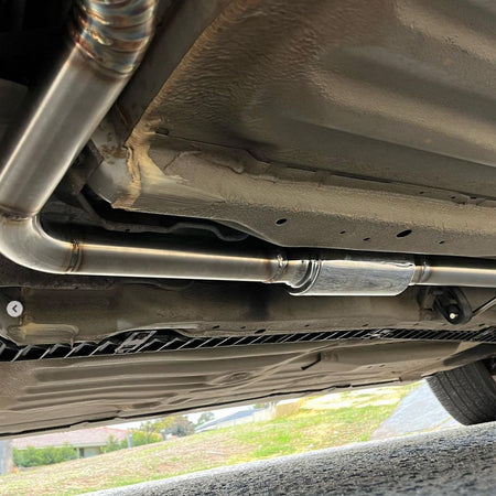 racecraft resonator stainless steel custom exhaust system view from under vehicle