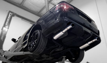 racecraft round mufflers custom exhaust on hsv maloo view from underneath