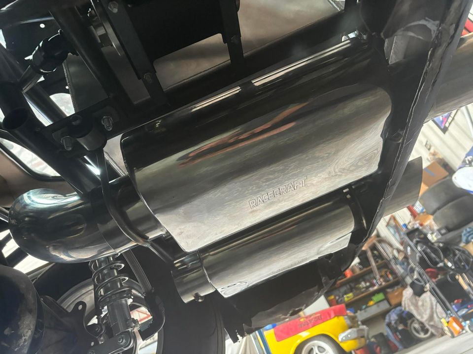 racecraft stainless oval skid series mufflers on burnout car