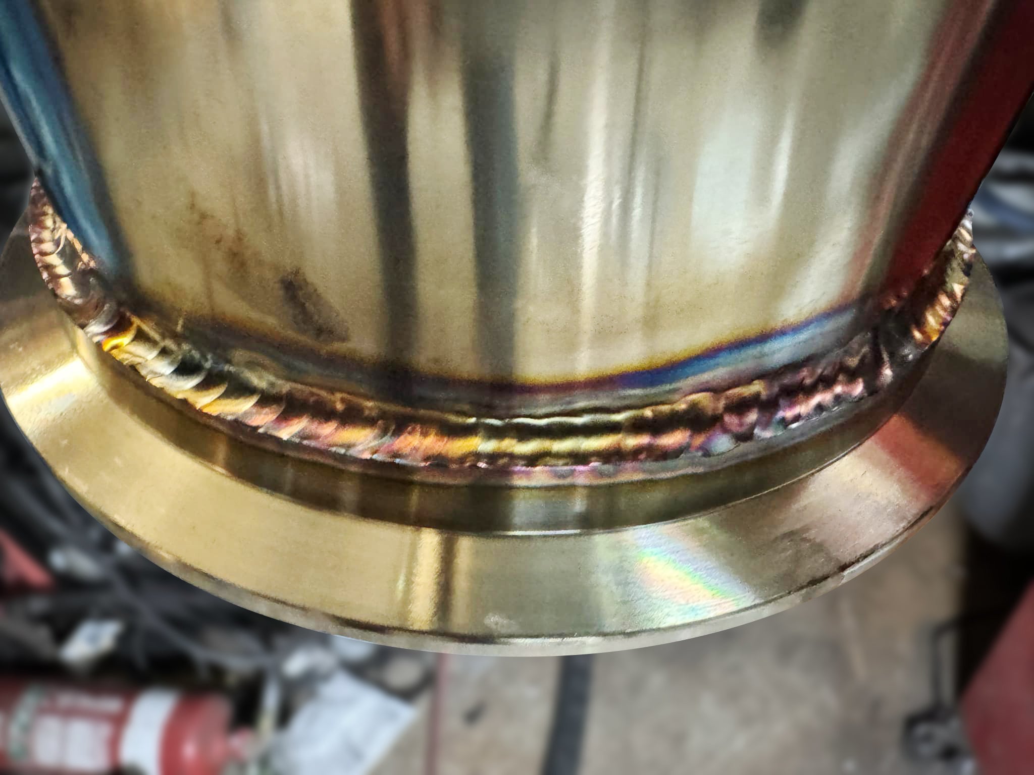 racecraft v-band clamp flange welded on exhaust tube close up view